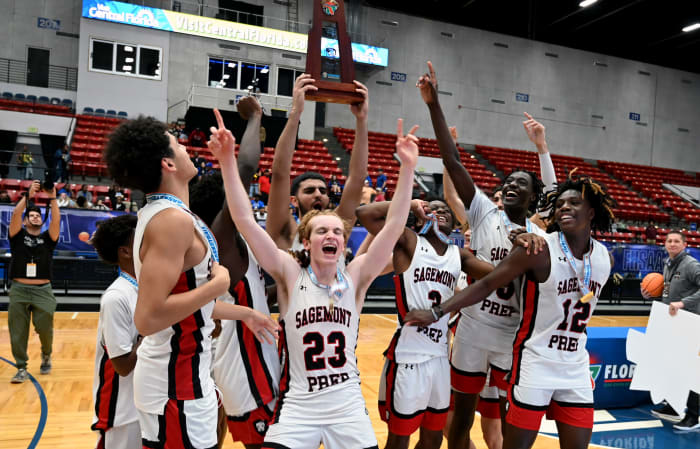Sagemont basketball players celebrate after winning their second consecutive Class 2A state championship on Thursday at the RP Funding Center in Lakeland.